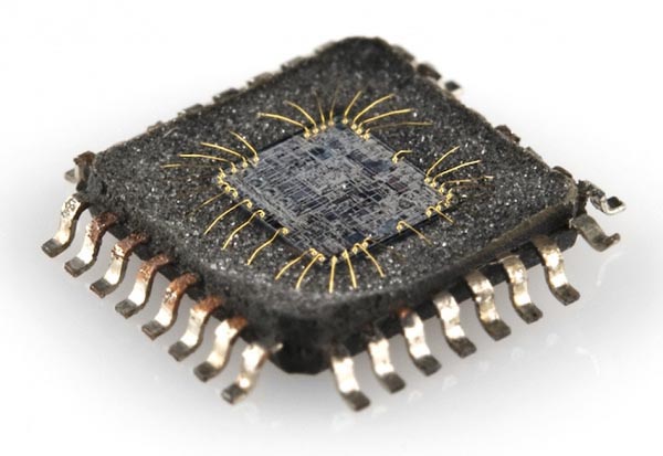 Decapping an IC- illustration by SparkFun