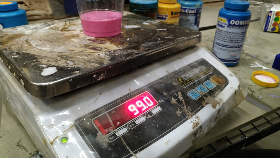 Pouring 100gm of Part A